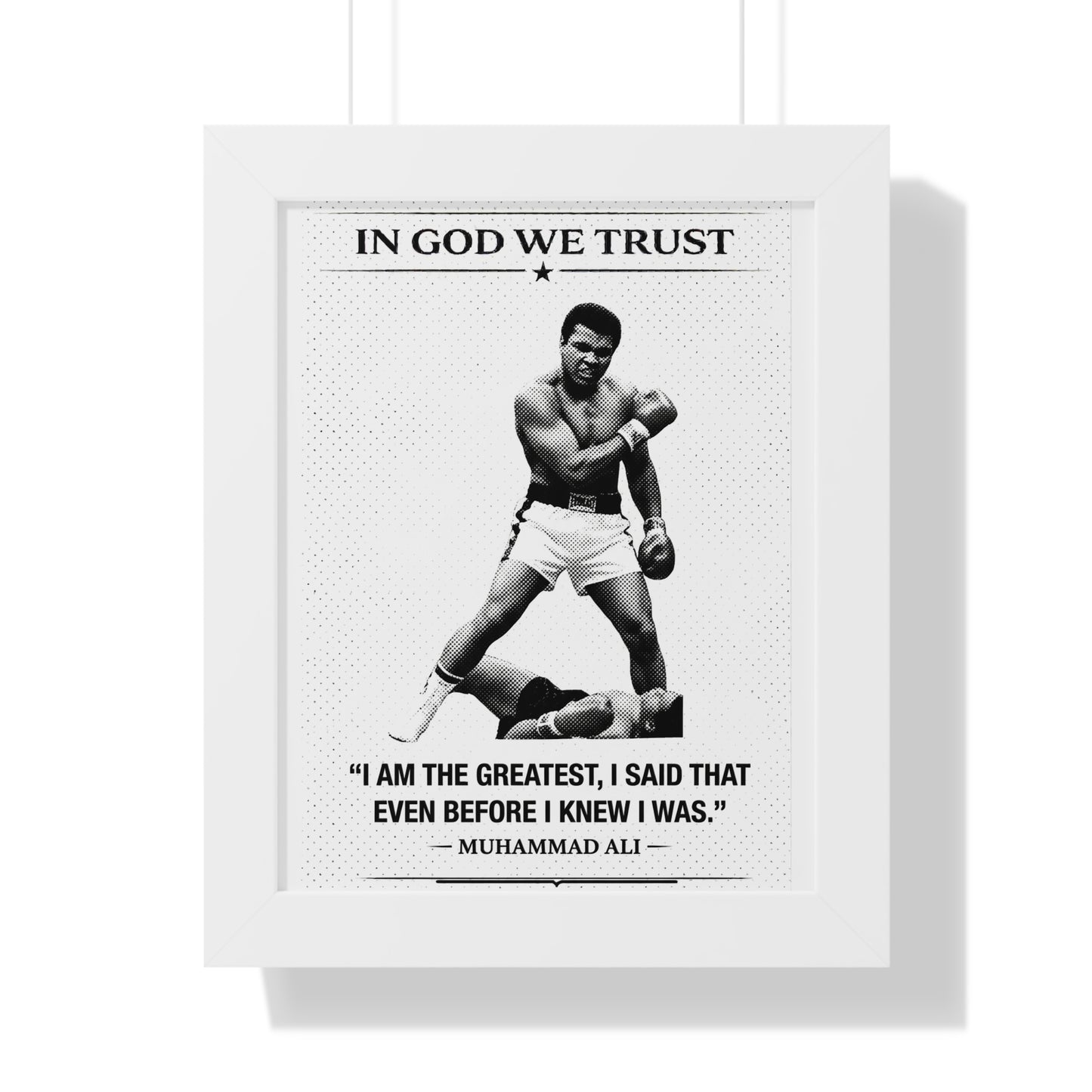 Framed poster with black and white image of a boxer and Muhammad Ali quote.