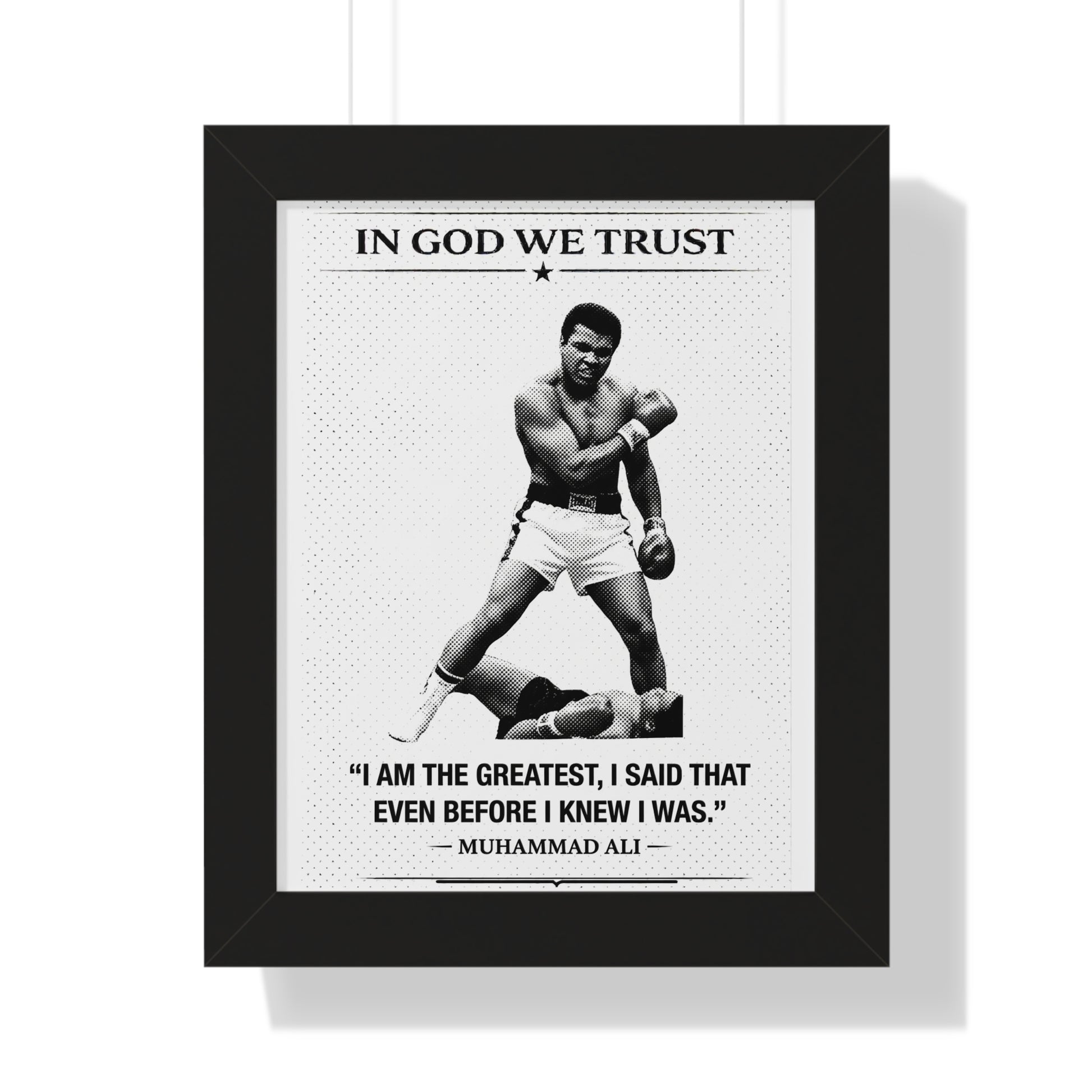 Framed poster with Muhammad Ali quote and image, featuring 'In God We Trust' at the top.