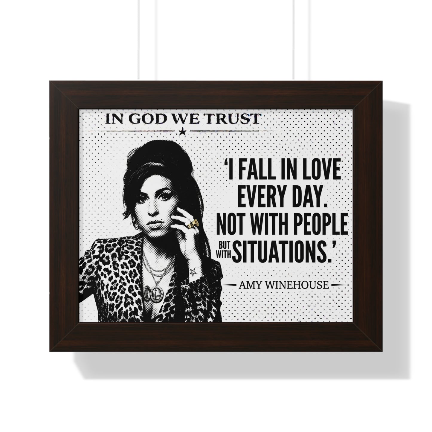 Framed poster with black and white image of a woman and text quote on a white background