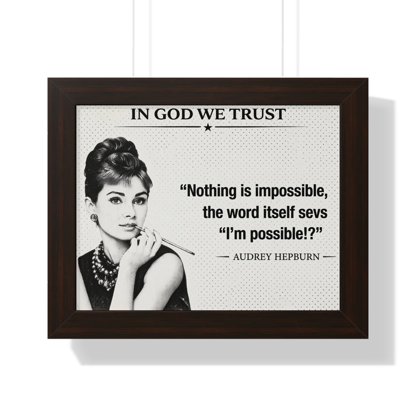 Framed poster with Audrey Hepburn and motivational quote on a white background