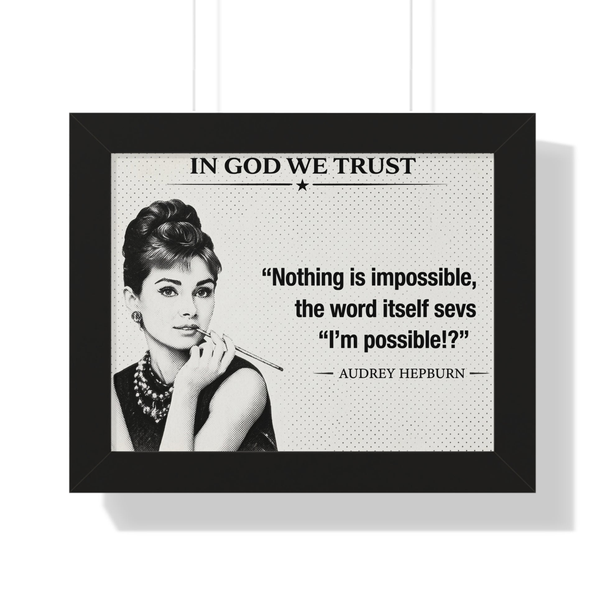 Framed poster with Audrey Hepburn and a quote on a white background