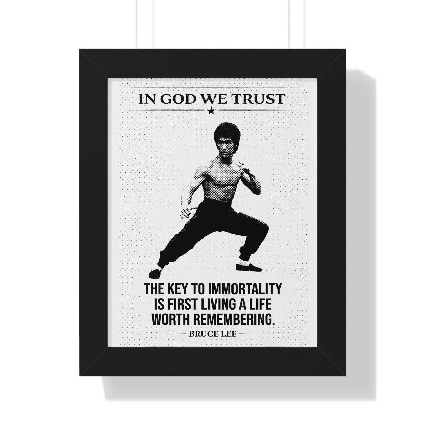 Framed poster with Bruce Lee quote 'In God We Trust' and 'The key to immortality is first living a life worth remembering.'