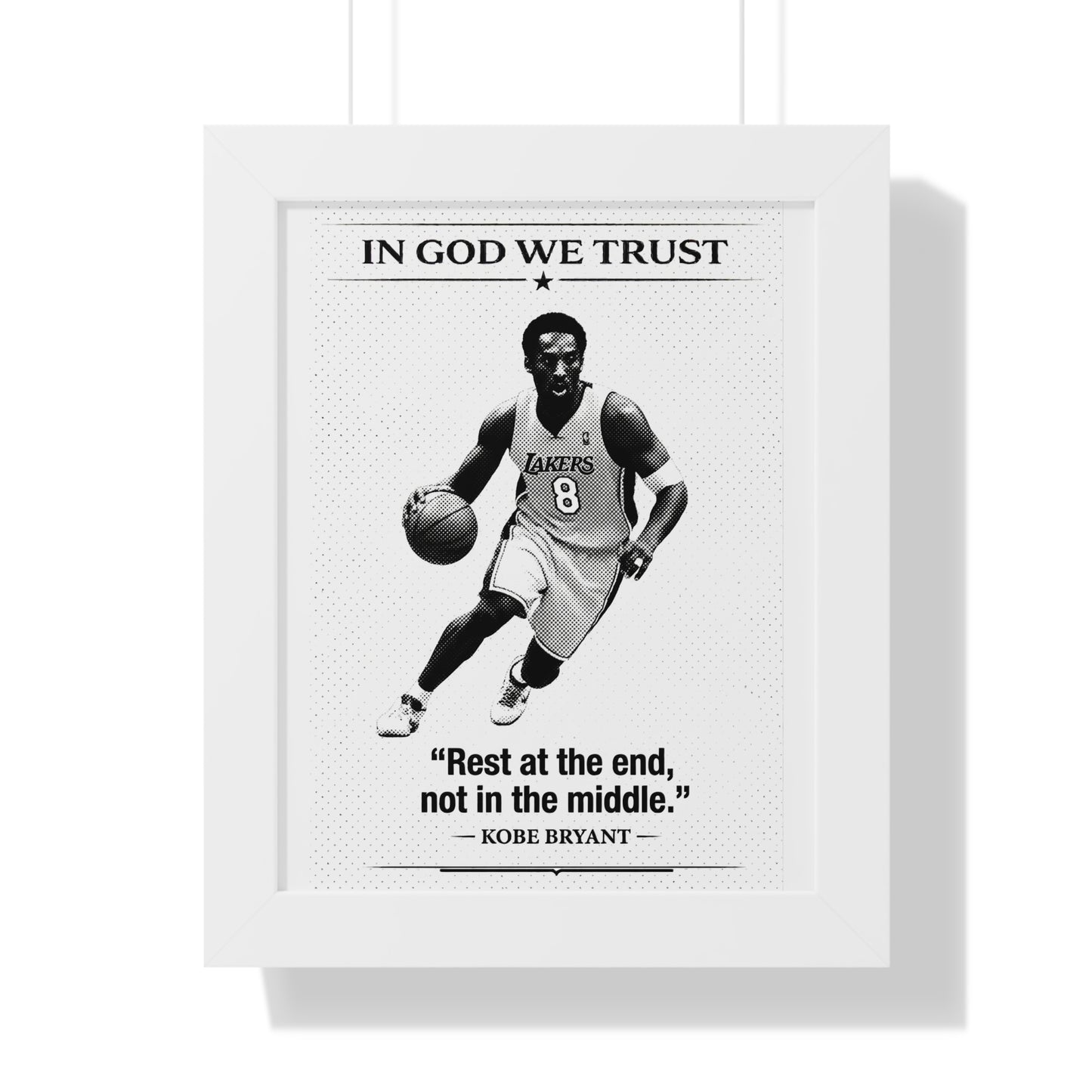 Framed poster with a black and white image of a basketball player, text 'In God We Trust', and a quote about Kobe Bryant.