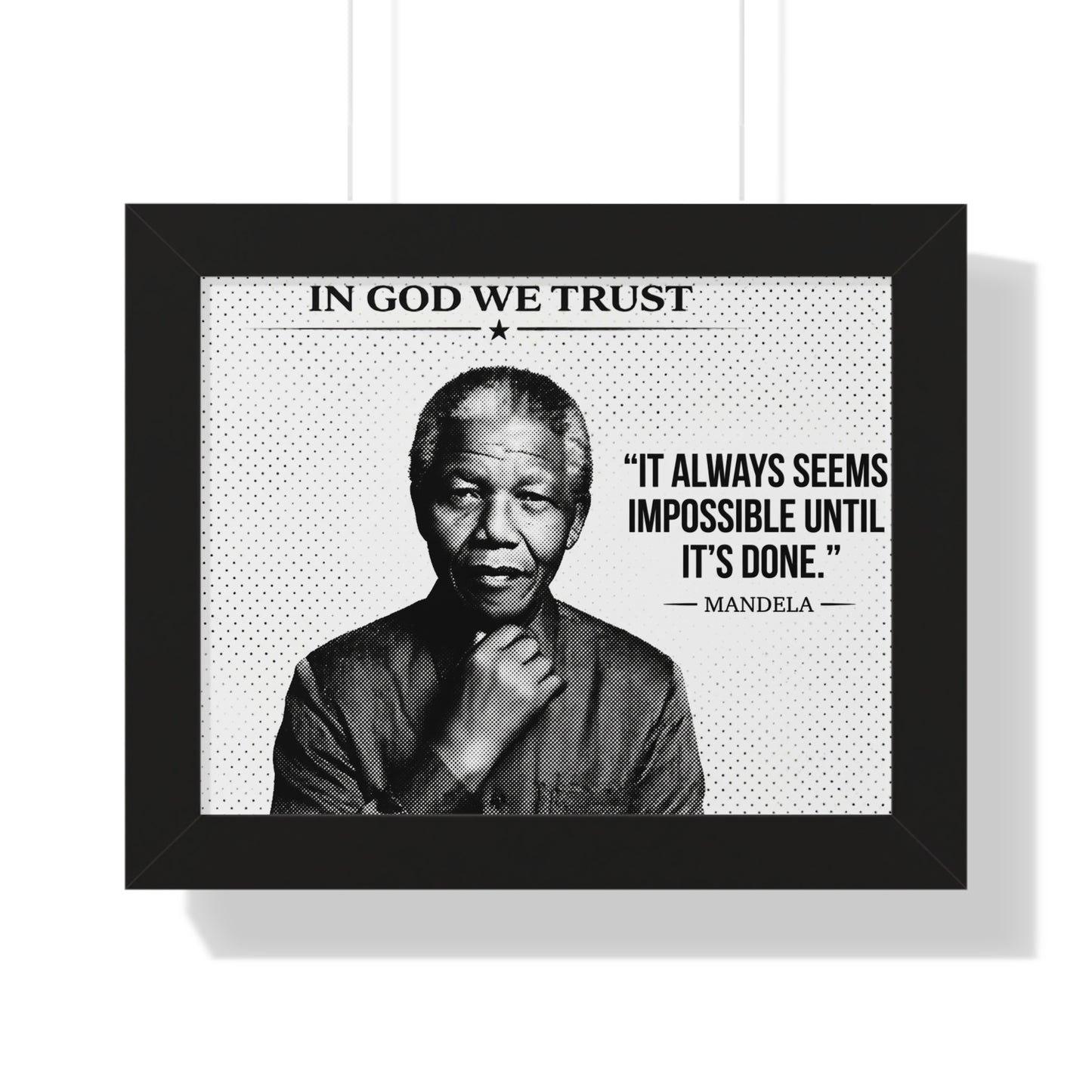 Framed poster with a black and white portrait of a famous person, text 'In God We Trust', and a quote by Mandela.
