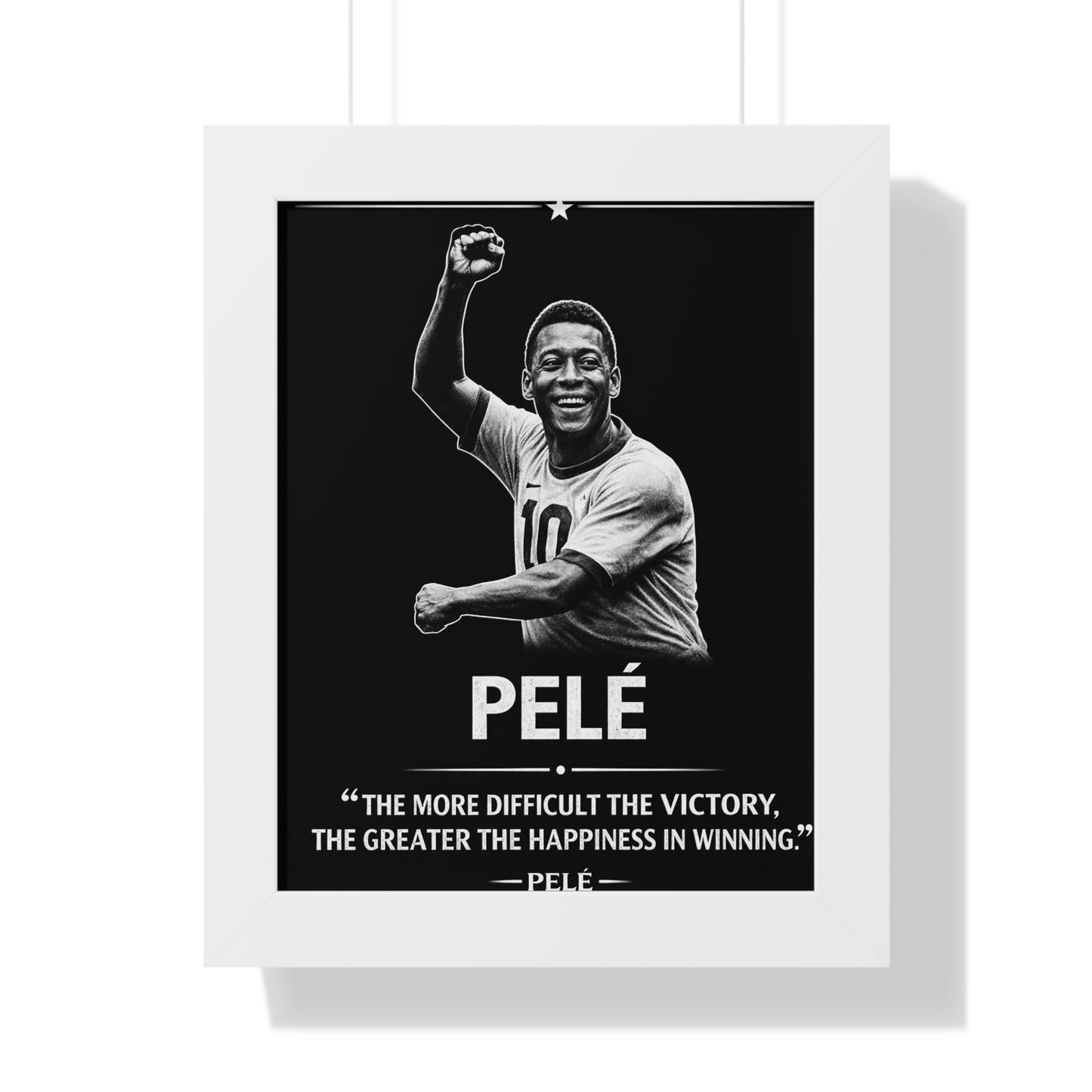 Framed poster of a soccer player with a quote by Pelé on a black background.