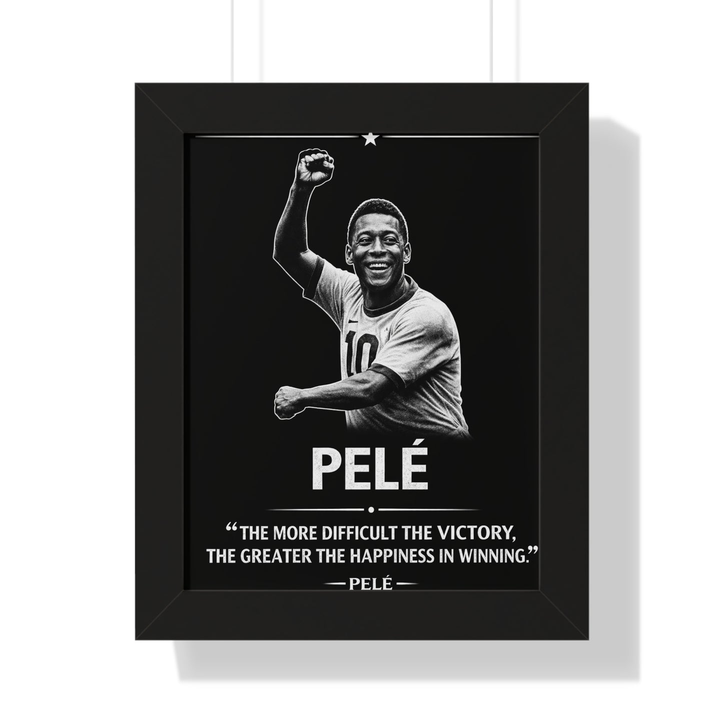 Framed poster of a soccer player with a quote by Pelé on a black background