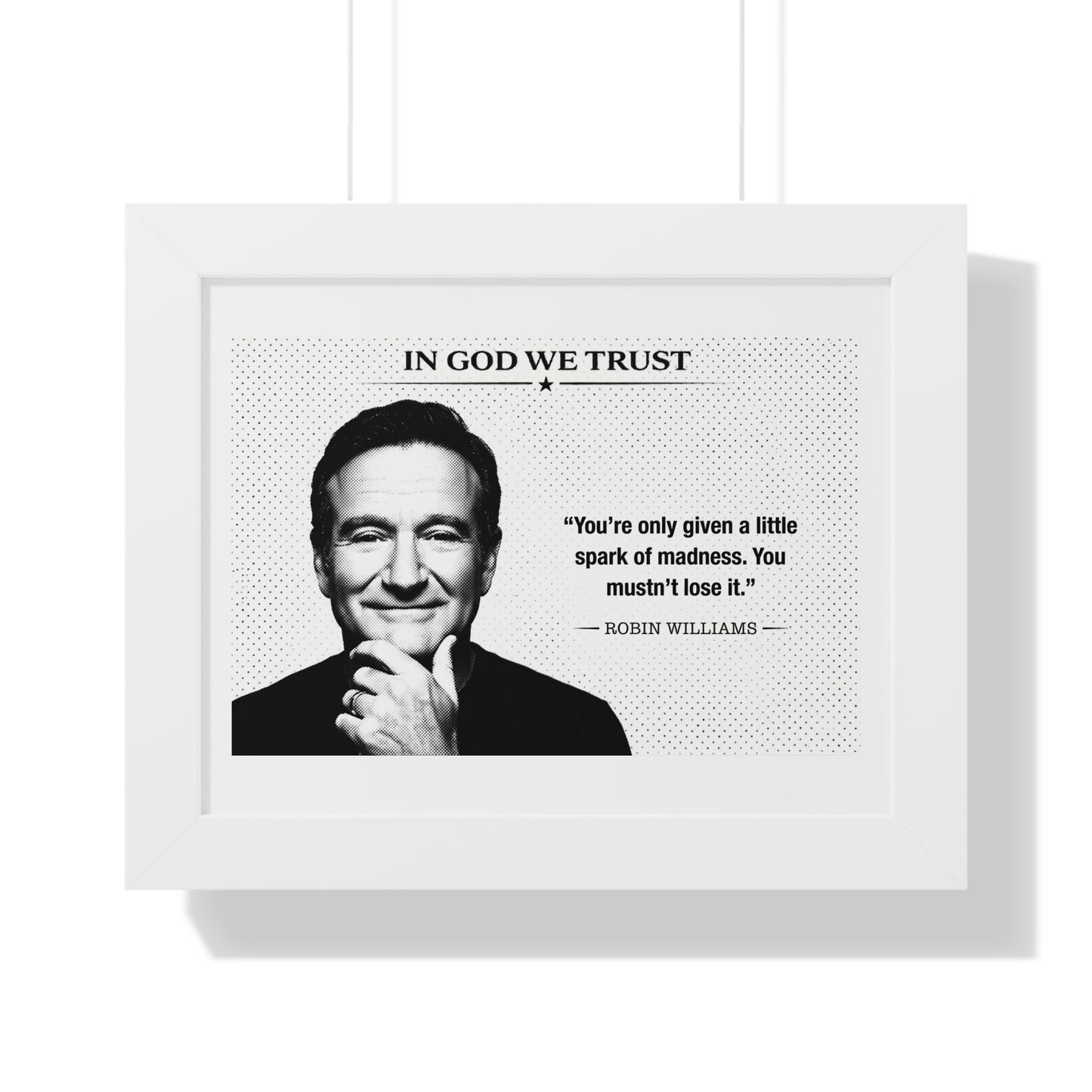 Framed poster with a portrait of a person and a quote by Robin Williams, featuring the text 'In God We Trust'.
