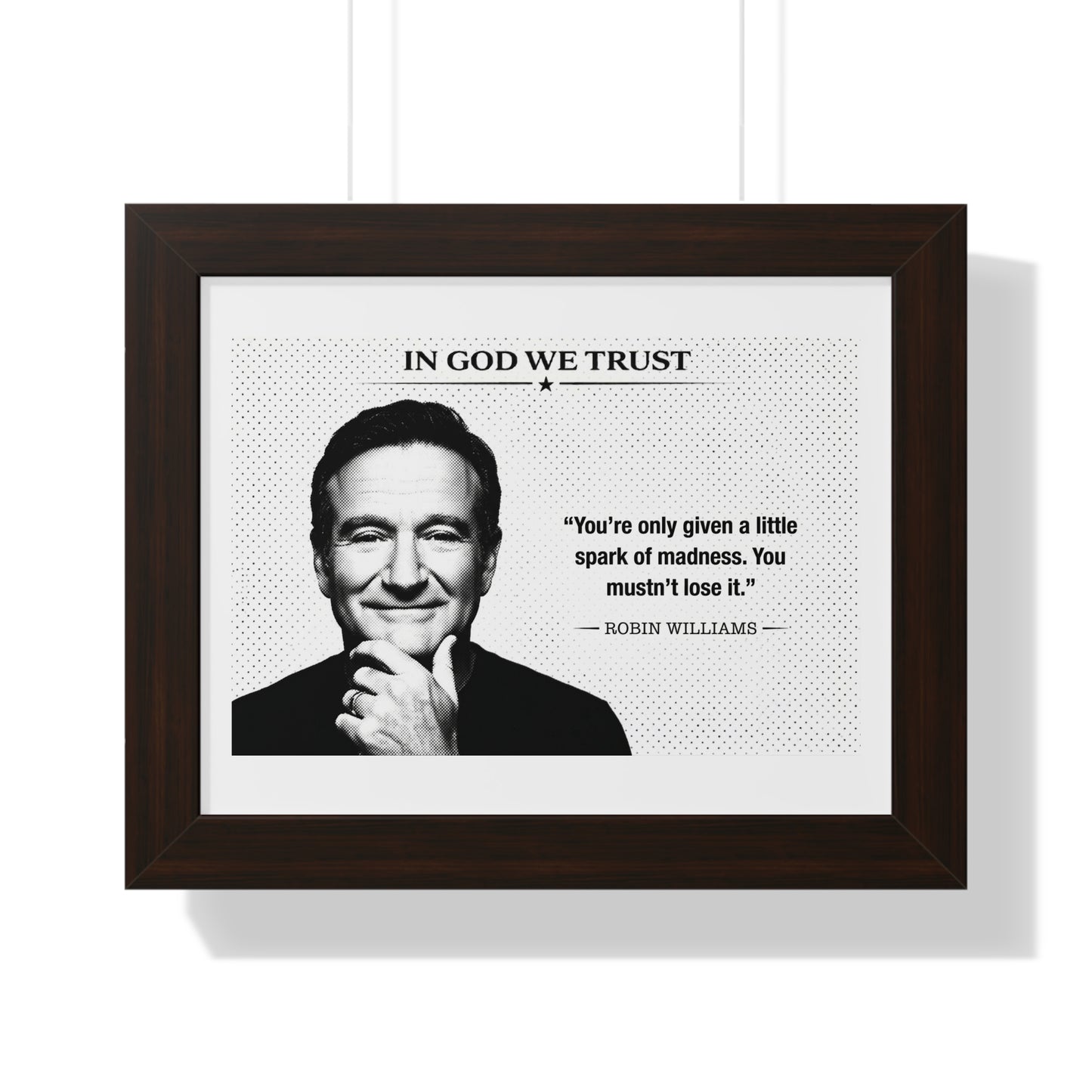Framed print with a portrait of a person and a quote by Robin Williams on a white background.