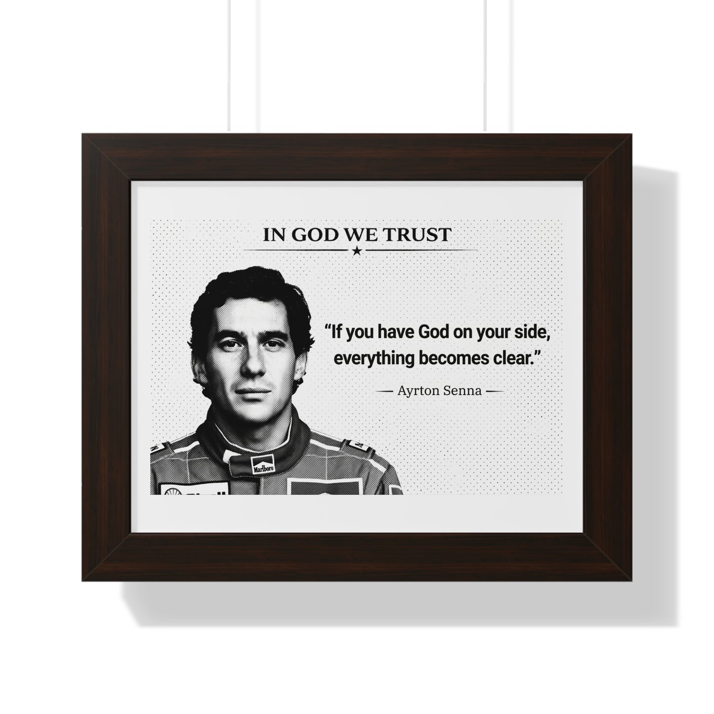 Framed poster with Ayrton Senna's quote 'In God We Trust' on a white background