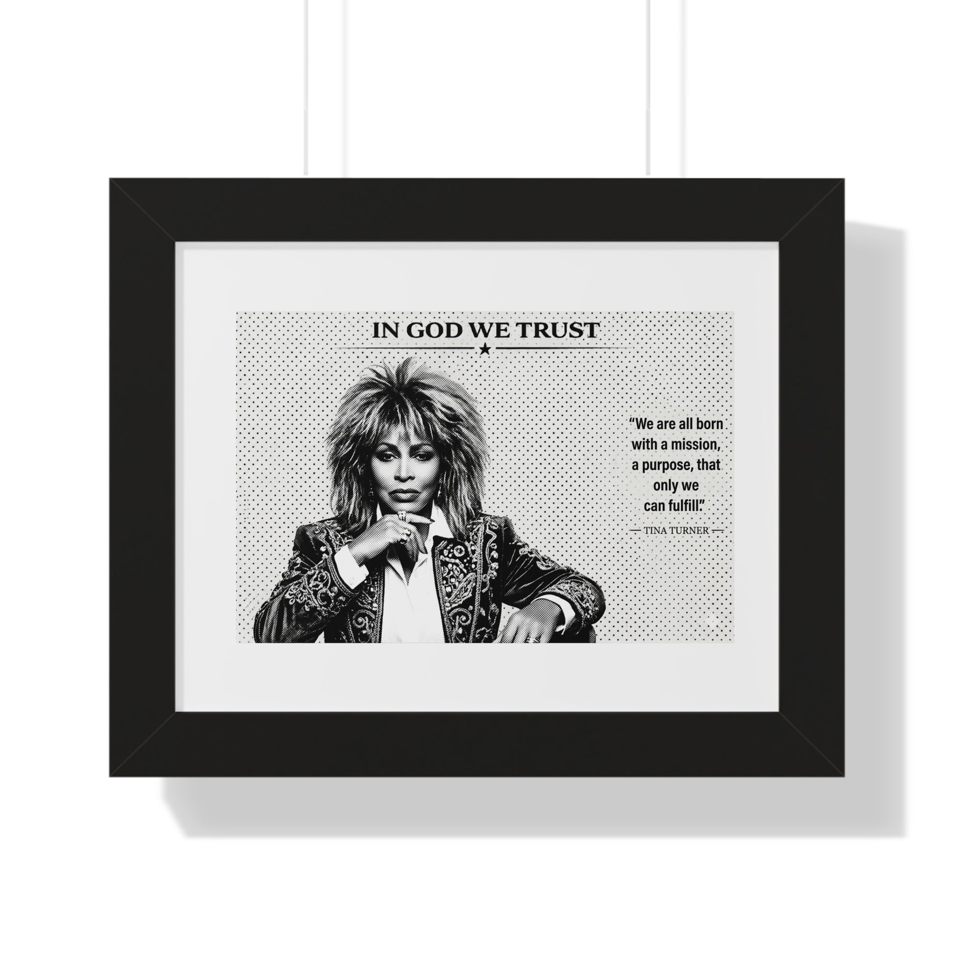 Framed poster with a black and white portrait of a person and text on a white background