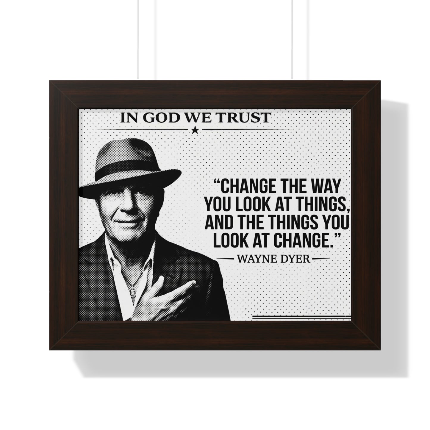 Framed poster with a quote by Wayne Dyer and a portrait of a man wearing a hat.