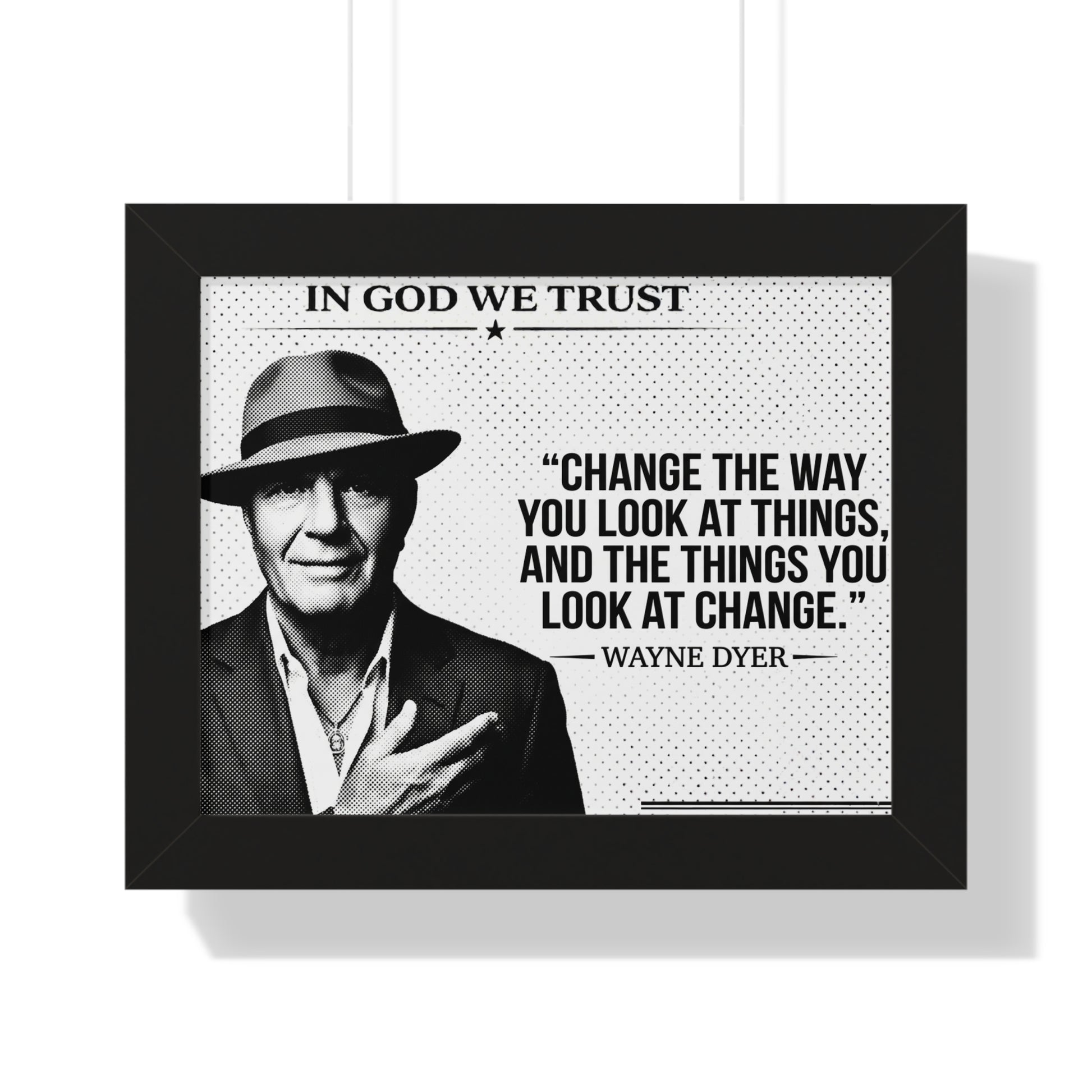 Framed poster with a quote by Wayne Dyer and a portrait of a man wearing a hat.