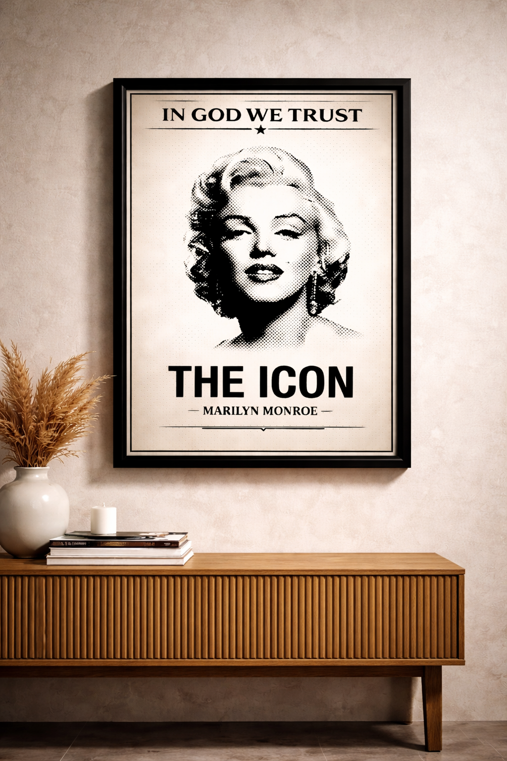 Framed poster of Marilyn Monroe with 'In God We Trust' above her portrait on a wall.