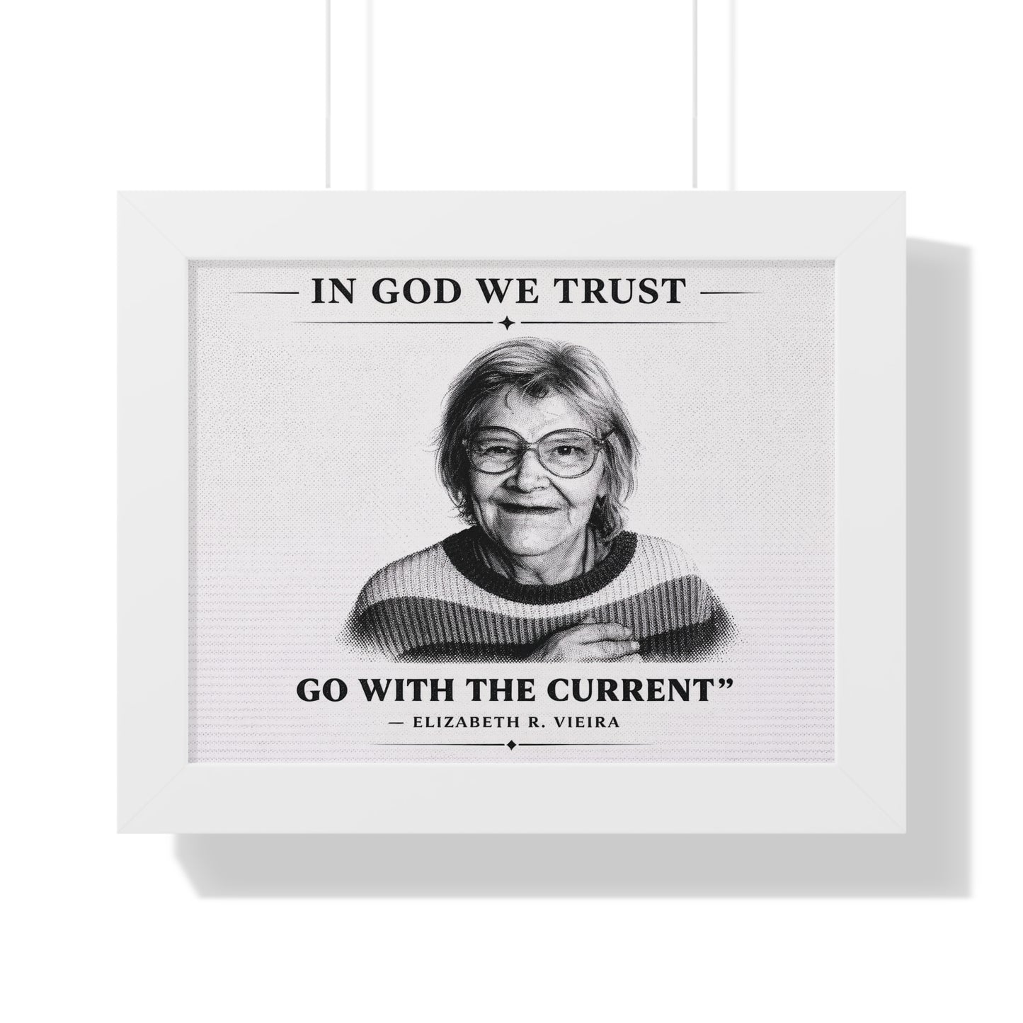 Framed poster with a portrait of a woman and text 'In God We Trust, Go with the Current' by Elizabeth R. Vieira.